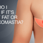 Man checking for signs of gynecomastia at home